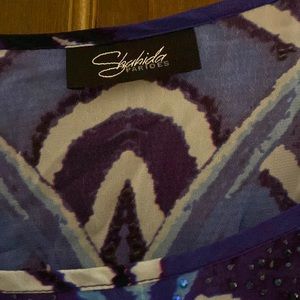 This is a shashida Paradis again bought it on a spree and only tried it on.